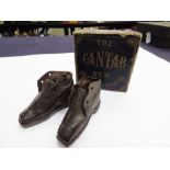 A pair of very small hand made, 19th Century leather boots in an Edwardian box