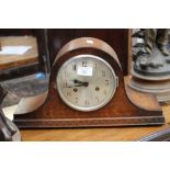 An early 20th Century oak mantle clock,