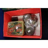 A box containing tins and bags of a mixture of coins, includes both British and Foreign