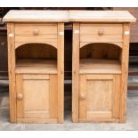 A pair of pine bedside cabinets, each fitted with a single drawer over a single door (2)