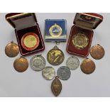 A collection of medals and medallions, includes Sporting Medals, Religious Medallions and