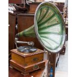 An early 20th Century Einwurf or Penny gramophone with horn,