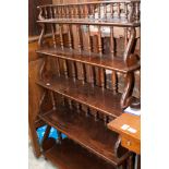 A Victorian mahogany graduated bookshelf, each tier with a spindle gallery to back