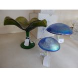 A pair of Heron glass iridescent toad stools, boxed and a Loetz style glass bowl