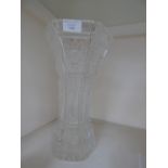 An early 20th century cut glass hexagonal vase with a star cut base 32 cm high