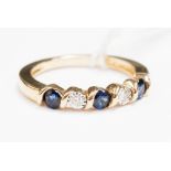 A 14ct gold sapphire and diamond five-stone ring