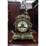 A gilded brass late Victorian mantel clock