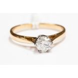 An 18ct gold and diamond solitaire ring, approx 0.