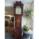 An early 19th century mahogany eight day longcase clock, the hood with swan neck pediment,