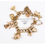 A 9ct gold charm bracelet with charms, 37.