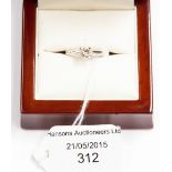 An 18ct gold and diamond solitaire ring, 0.