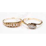 An 18ct gold five stone graduated diamond ring and a three stone diamond ring