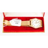 A gentlemen's gilt metal Omega wristwatch with baton numerals, date aperture,