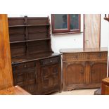 A Jacobean style oak dresser and rack,