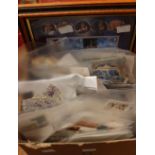 A box of assorted stamps,