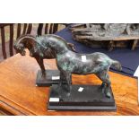 Two bronzed figures of horses,