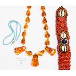 An amber bead necklace;