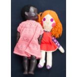 A plastic Negro doll, having opening and closing eyes, and working cry when moved,
