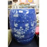 A Chinese pottery blue and white barrel shaped garden seat, decorated with birds,