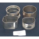 Four silver napkin rings including modernist example by Staffordshire College of Further Education,