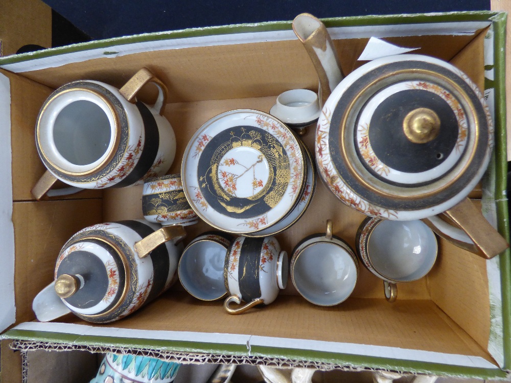 An early 20th century Japanese eggshell coffee set, comprising coffee pot, cream jug, sugar bowl,