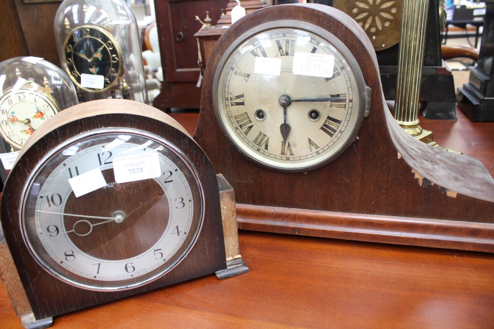 A Napoleon hat style mantle clock by W.H.