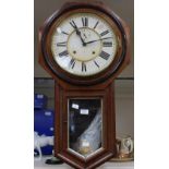 A large wall hanging clock by Ansonia Clock Co, New York, in walnut veneer case,