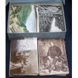 A box containing a collection of various postcards, depicting various plates,