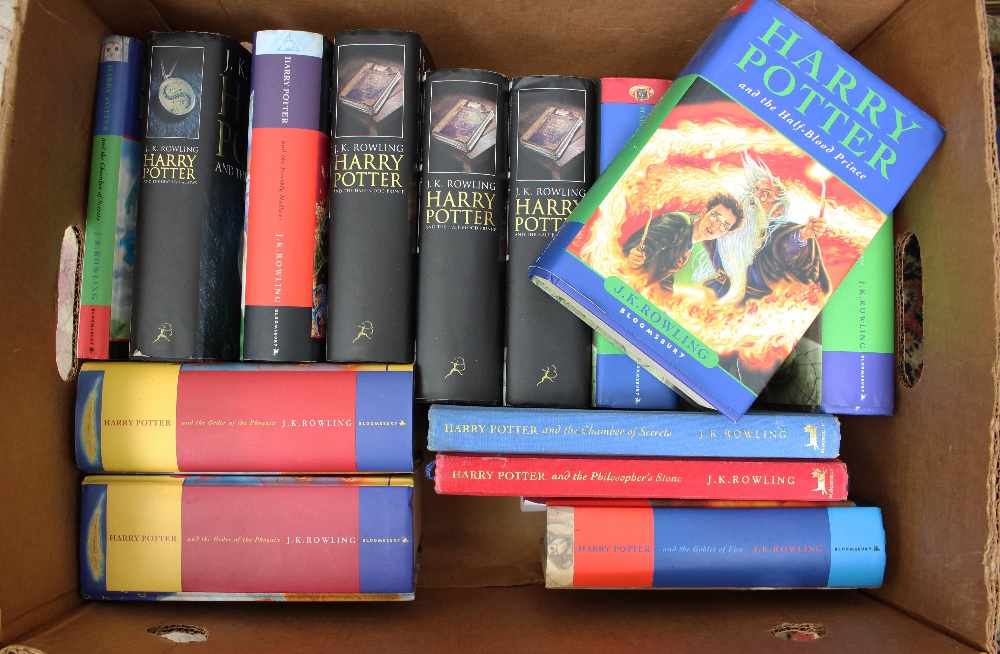 A collection of fourteen hardback Harry Potter books,