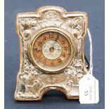 A silver faced easel timepiece,