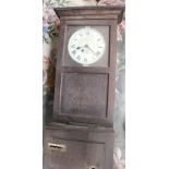 An oak clocking in clock,