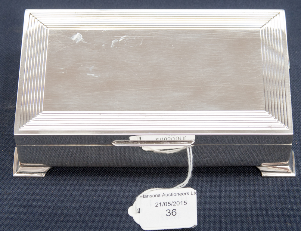 An Art Deco style wood lined silver box Birmingham 1963,