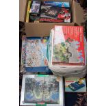 A large quantity of modern boxed puzzles and games