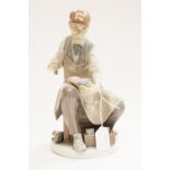 A Lladro figure of a Cobbler (hammer missing)