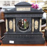 A slate mantle clock,