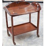 An early 20th century mahogany drinks trolley