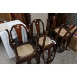 A set of six 1920's Queen Anne style mahogany dining chairs,