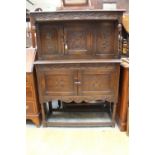 A 17th Century style oak court cupboard of pegs mortice and tenon construction.