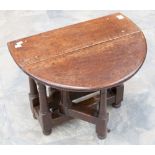 A 17th century style oak drop leaf coffee table