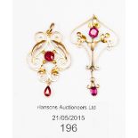 A 9ct Edwardian pendant with a ruby coloured stone setting,