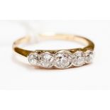 An 18ct gold five stone diamond ring,