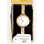 A 9ct gold wristwatch, the back engraved 'I.M.O.