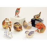 A collection of Royal Crown Derby paperweights including Monkey with child, Owl, Hummingbird,