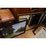 A large gilt framed mirror, with bevelled edge glass,