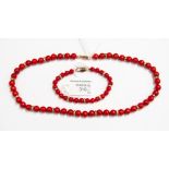 A Coral single strand necklace, with approximately 49 dyed coral beads, each approximately 8mm,