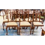 Seven Chippendale style chairs including one carver