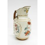 A Royal Worcester jug, gilt handle with inset shell design to sides, floral decoration pattern 1437,