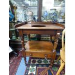 An early Victorian mahogany washstand fitted with a single drawer.