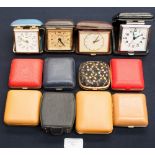 A collection of assorted folding travelling clocks,