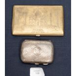 An Edwardian silver cigarette case, planished, cushioned form,